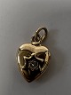 Antik Huset præsenterer: 14 karat guld. Hjerte med indlagt diamant.Charms / Vedhæng.Højde 1,1 cm.