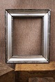 K&Co. presents: French 19th century silver frame with fine old patina. Outer dimensions: 29x35cm...