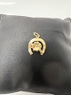 14 karat guld. Hestesko med en Firkløver. Charms / ...