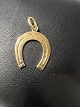 14 karat guld. Hestesko. Charms / Vedhæng.Højde 2,3 cm.