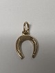 14 karat guld. Hestesko. Charms / Vedhæng.Højde 1,4 cm.