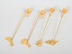 L'Art presents: Andreas Mikkelsen for Georg Jensen, set of four Golden Christmas candleholders.