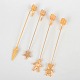 L'Art presents: Andreas Mikkelsen for Georg Jensen, set of four Golden Christmas candleholders.