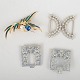 L'Art presents: Set of one belt buckle and three brooches.