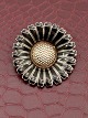 Middelfart Antik presents: Bernhard Hertz sterling silver daisy brooch