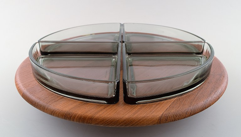 Flemming Digsmed, round cabaret dish on swivel base, teak with inserts of 
colored glass.