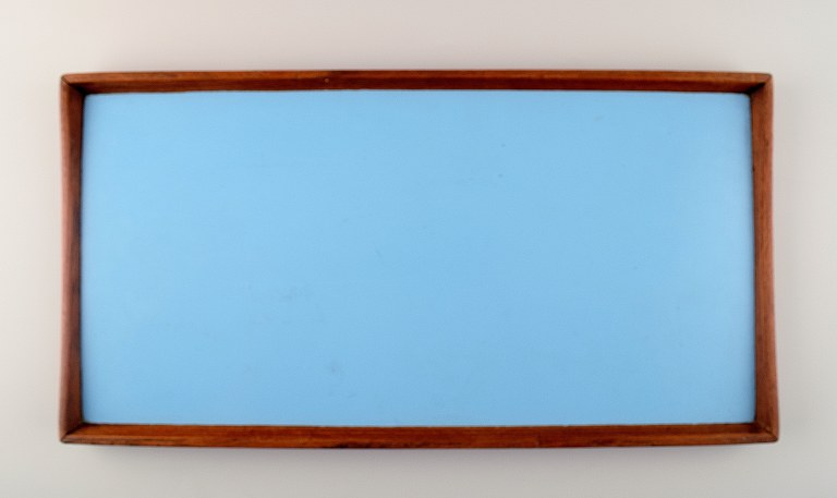 Finn Juhl: Reversible tray of teak with turquoise and black melamine.
