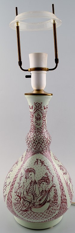 Bjørn Wiinblad, Nymølle table lamp in earthenware with 4 different motifs in 
red.