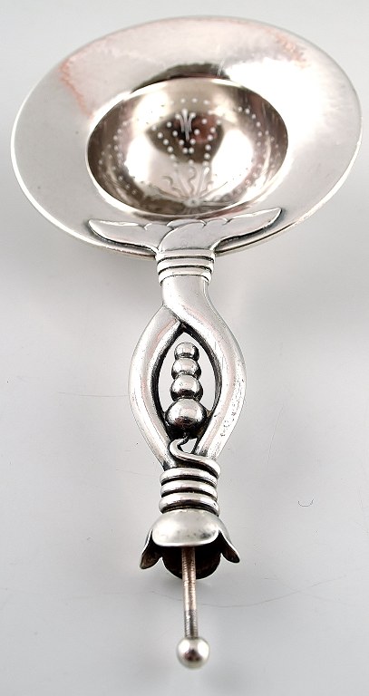 Danish strainer in silver.
