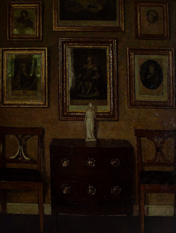 Niels Holsøe b. Copenhagen 1865, d. 1928 Charlottenlund:
Interior with chest of drawers and engravings on the wall.