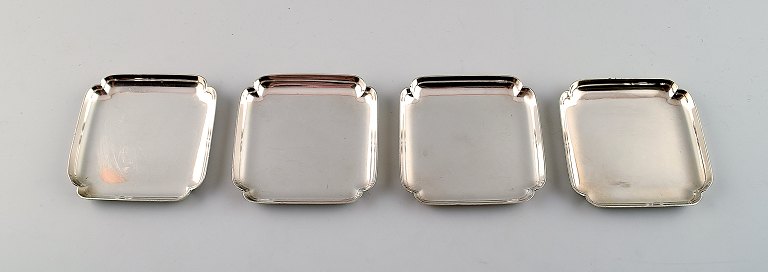 4 pcs. Tiffany & Co., New York, Sterling Silver coasters.
