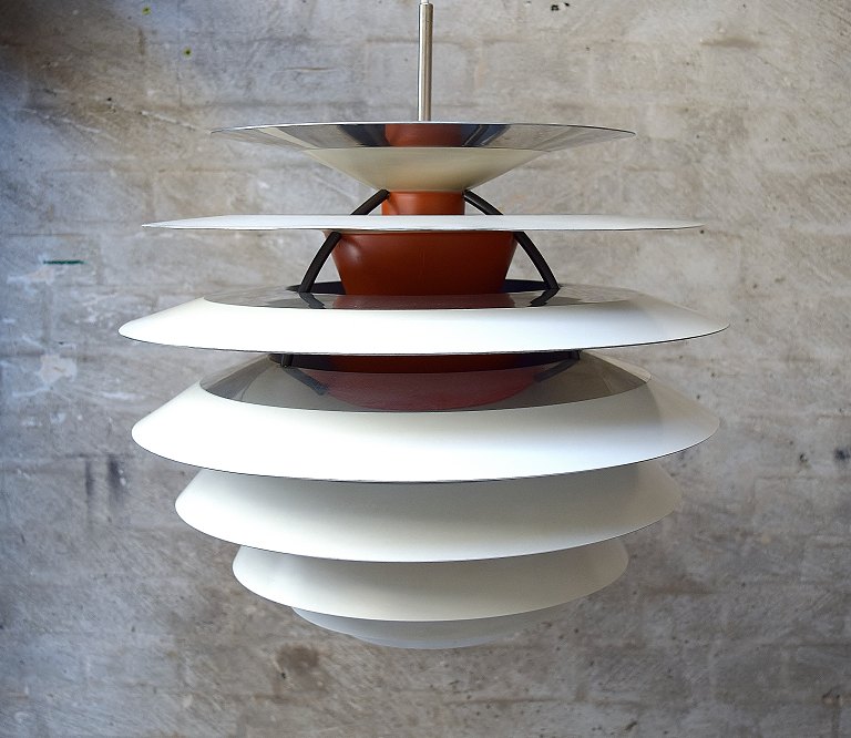 Poul Henningsen: "Contrast". Pendant with white- and orange-lacquered metal 
lamellas.