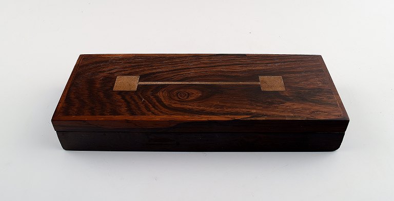 Hans Hansen: Shrine / box in rosewood inlaid with silver.
