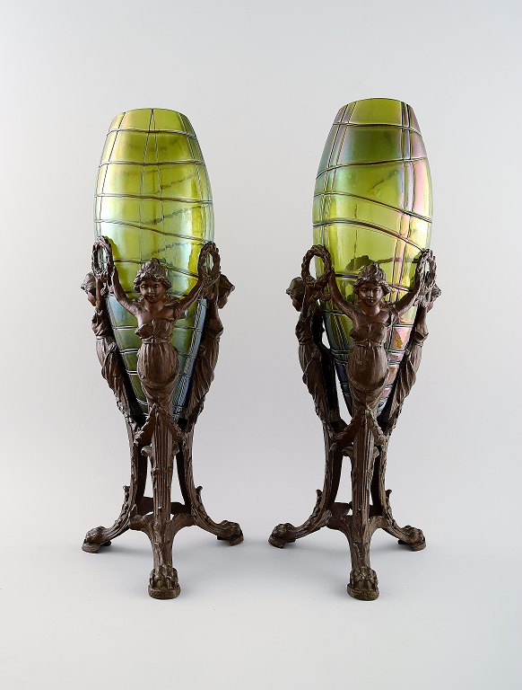 Palme König: A pair of Art Nouveau Vases of irritated and frosted clear green 
glass. Bronze Holder in the form of women on tripod.