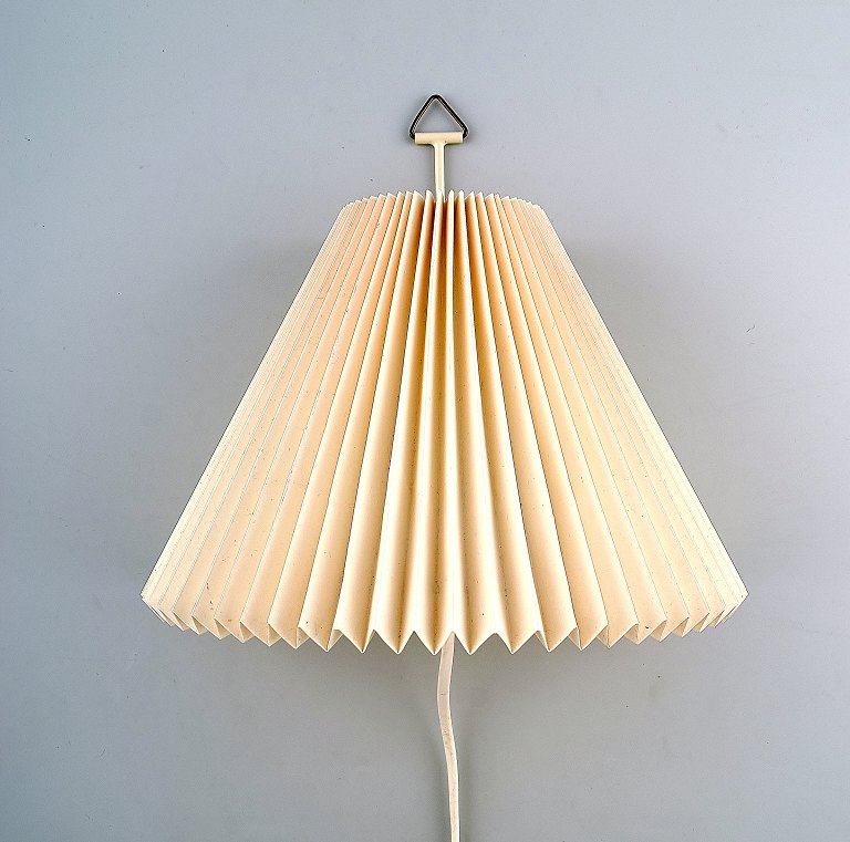 Le Klint wall lamp with pleated screen.
