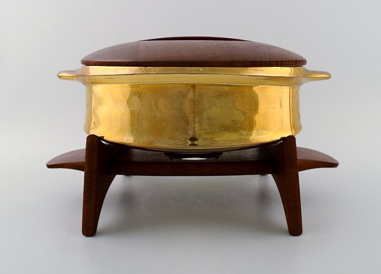 Jens H. Quistgaard: A brass pot with solid teak plinth and lid. 
