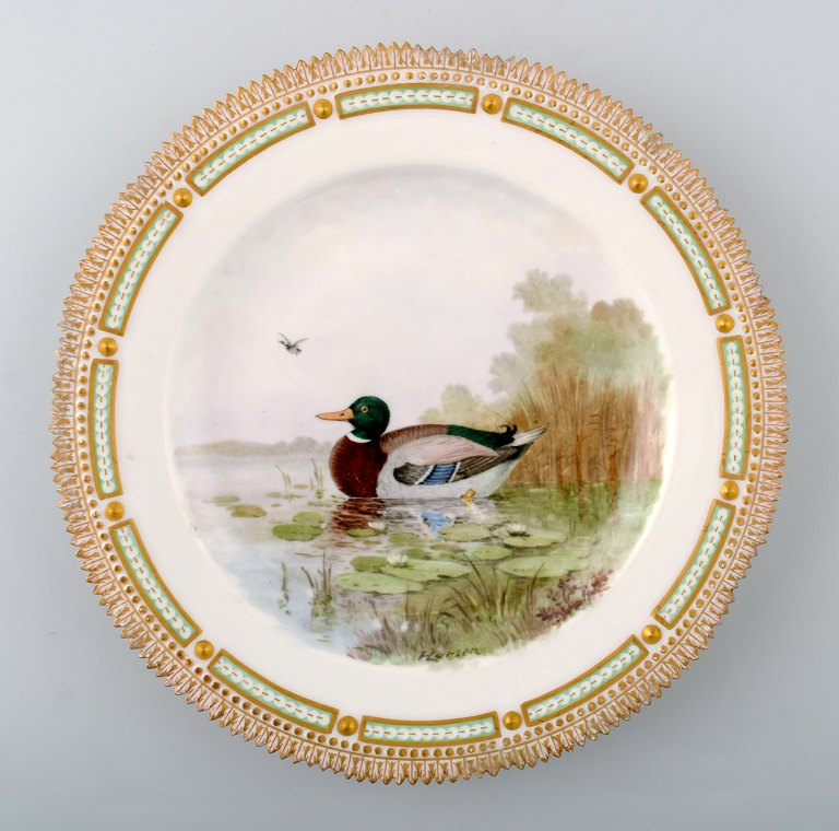 Royal Copenhagen Flora Danica / fauna Danica dinner plate with  motive of a duck 
in landscape.