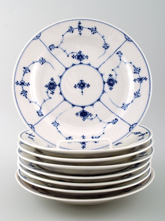 Rare and antique Royal Copenhagen Blue fluted, 8 plates.
