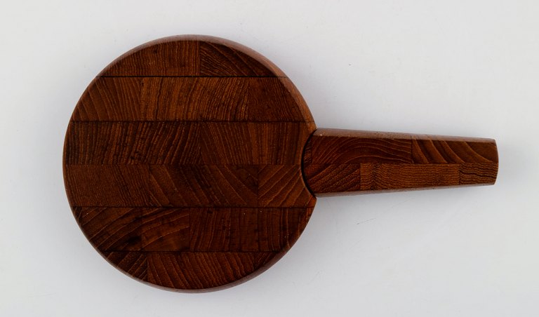 Jens Harald Quistgaard. Teak wood cutting board with built-in knife.
Danish design, 1960s.