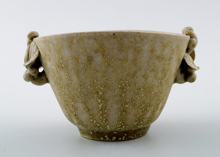 Arne Bang. Ceramic vase with foliage.
