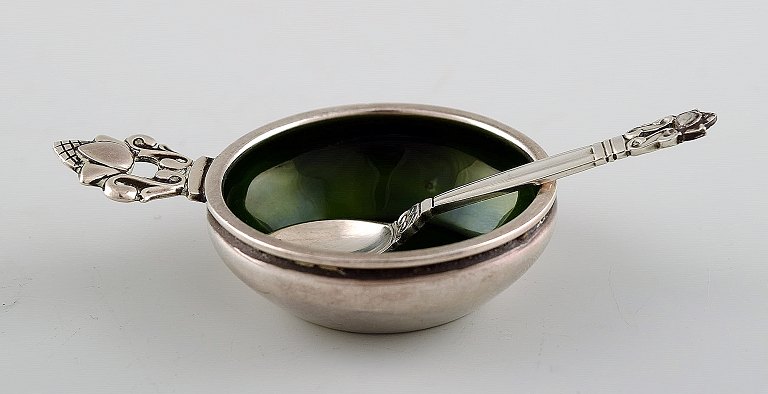 Georg Jensen, Acorn, salt cellar in sterling silver with green enamel with 
matching spoon.