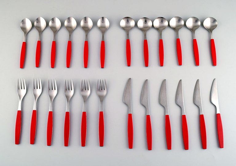 Complete service for 6 p., Henning Koppel. Strata cutlery in stainless steel and 
red plastic. Manufactured by Georg Jensen.