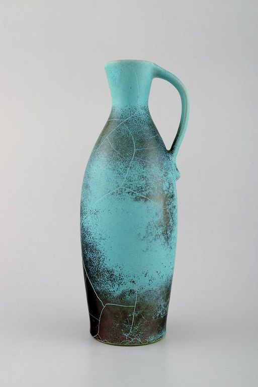 Richard Uhlemeyer, tysk keramiker.
Keramik kande, smuk krakeleret glasur i grøn røde nuancer.