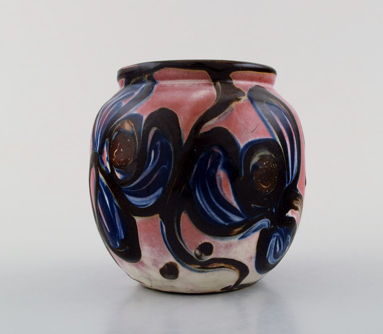 Kähler, Denmark, glazed stoneware vase. 1940 s. Blue flowers on pink base.
