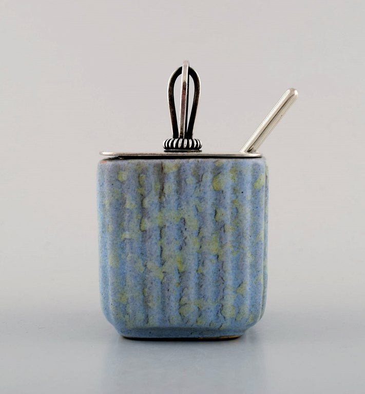 Michael Andersen, Denmark: Marmelade jar in ceramics, fluted style with plated 
silver lid and silver spoon by Hans Hansen.
