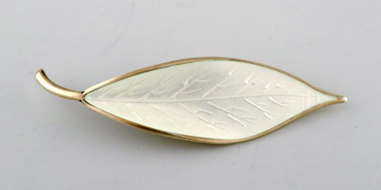 David Andersen. Norwegian brooch in gold plated sterling silver in the form of a 
leaf with enamel work. 1970