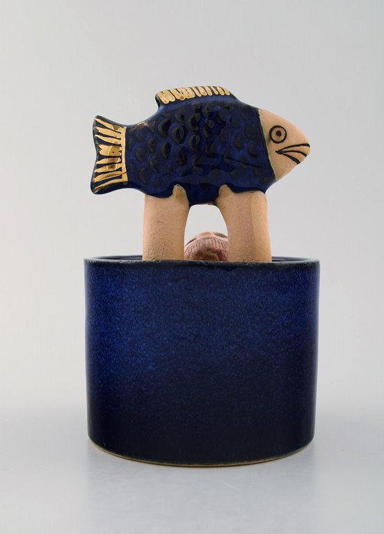 Lisa Larson for K-Studio / Gustavsberg. Lidded jar in deep blue glaze with man 
and fish.
