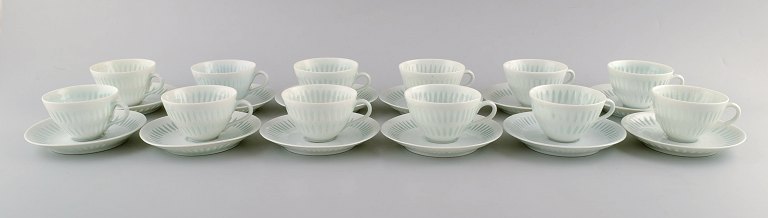 Freidl Holzer Kjellberg for Arabia. Complete 12 person coffee service in rice 
porcelain. Mid-1900.