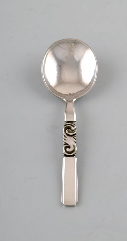 Georg Jensen. Cutlery, Scroll no. 22, hammered Sterling Silver. Bouillon spoon. 
3 pieces in stock.