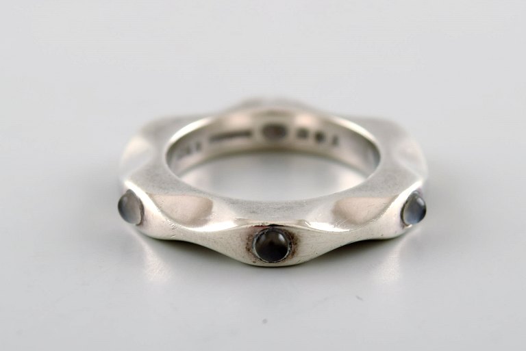 Maria Berntsen for Georg Jensen. "Mirror" ring in sterling silver adorned with 
three dark blue moon stones.