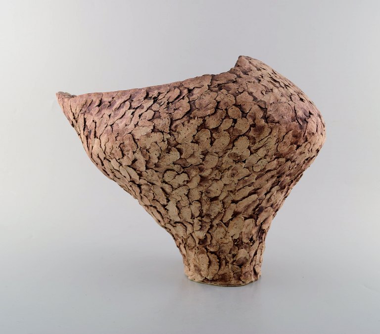 Ivy Lysdal, b. 1937. Danish ceramist and painter.
Large unique vase in organic shape. glaze in earth tones. 1970