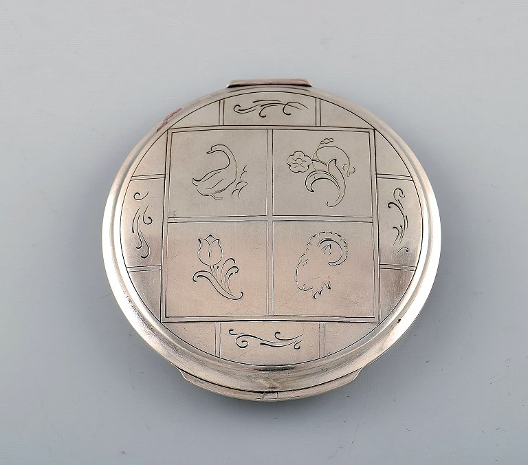 Harald Nielsen for Georg Jensen. Art deco powder box with mirror in sterling 
silver. Model number 231D.
