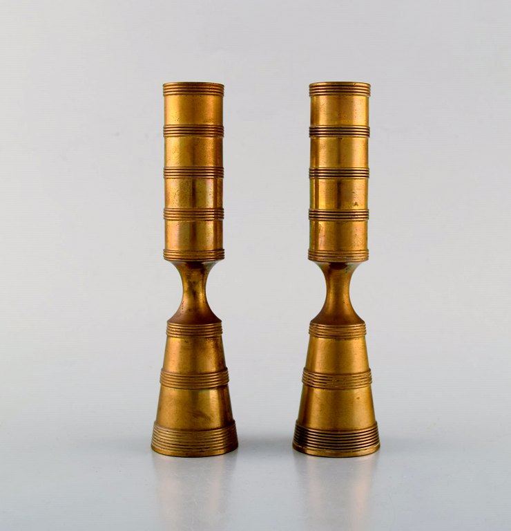 Jens H. Quistgaard. Two candlesticks in brass. Danish design, 1960