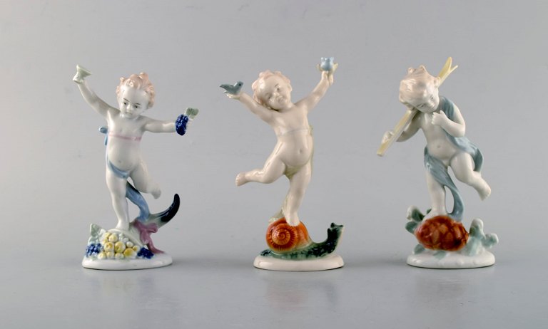 Three Ilmenau porcelain figurines. Dancing boy children. 1970