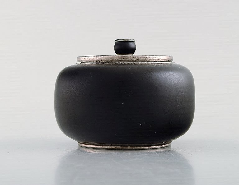 Gunnar Nylund for ALP Lidköping. Art deco ceramic lidded jar with silver inlay. 
1930 / 40