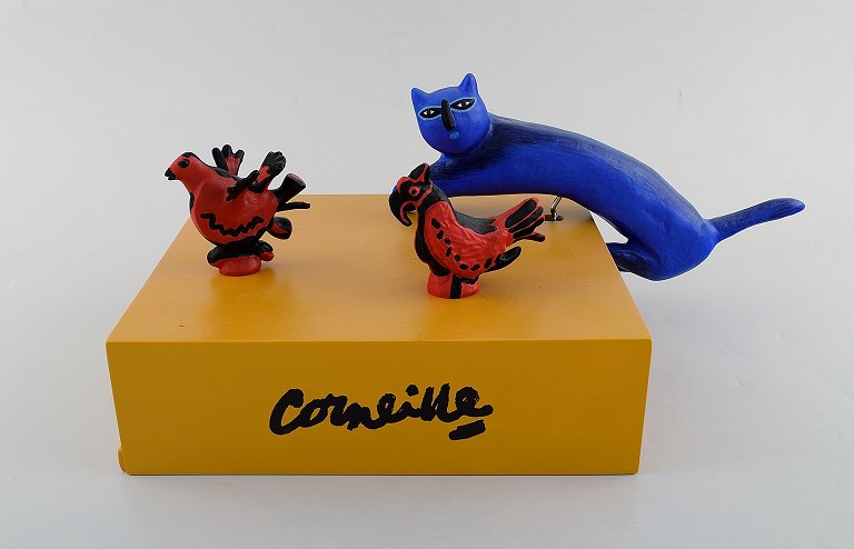 Corneille, Cobra artist. Sommelier set. Modern sculpture. Blue cat (corkscrew) 
and two red birds (mounted on cork plugs). Late 20th century.
