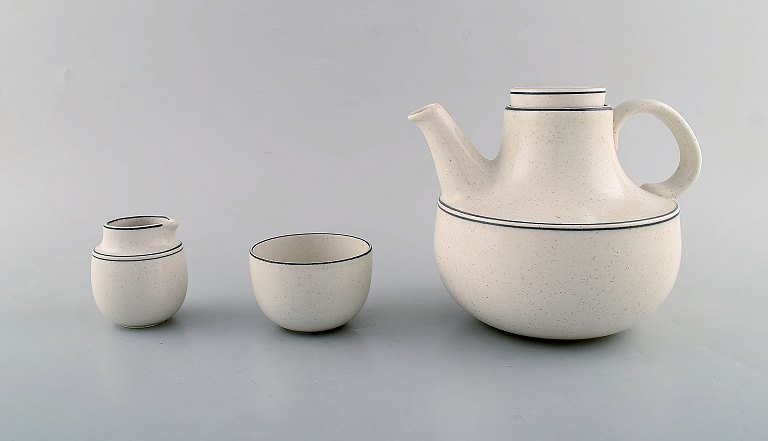 Stig Lindberg for Gustavsberg. "Birka" teapot with sugar / cream set in glazed 
stoneware. 1960