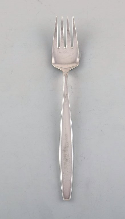 Tias Eckhoff for Georg Jensen. "Cypress" dinner fork in sterling silver. Four 
pieces in stock.
