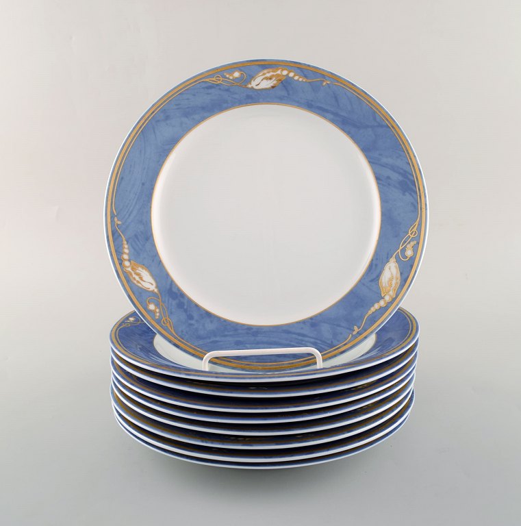 9 Royal Copenhagen Magnolia lunch plates. Late 20th century.
