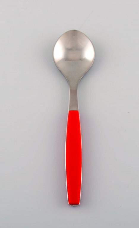 Henning Koppel for Georg Jensen. Strata teaspoon in stainless steel and red 
plastic.
