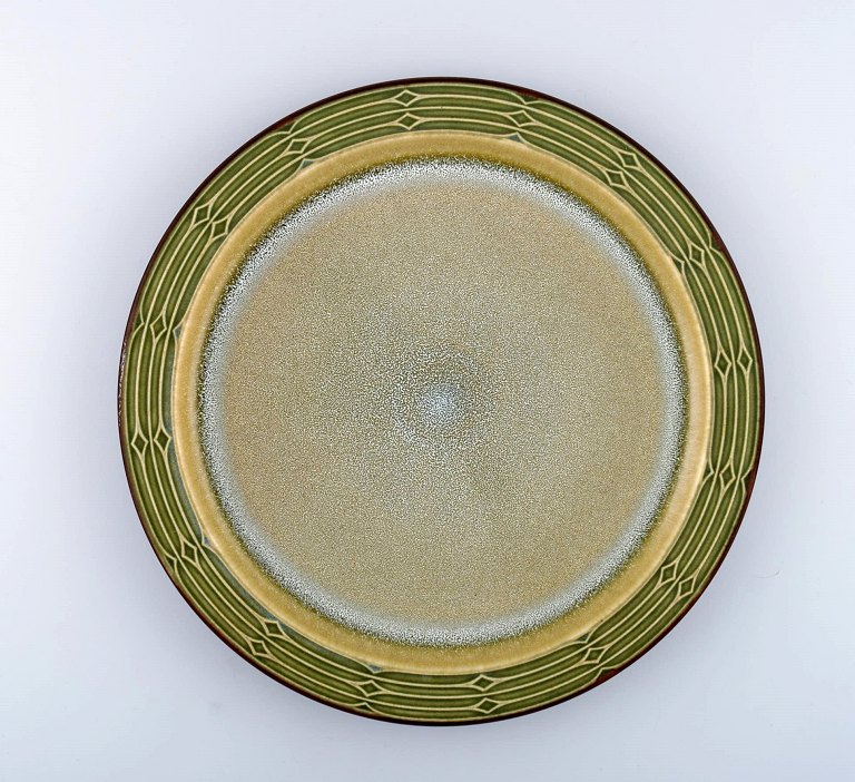 Jens H. Quistgaard (1919-2008) for Bing & Grondahl. Large round "Rune" dish in 
glazed stoneware. Two pieces in stock.
