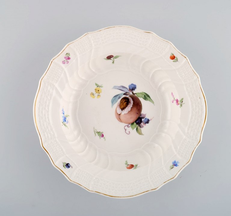 Antique Meissen deep plate in hand-painted porcelain with peach and flowers. 
19th century.
