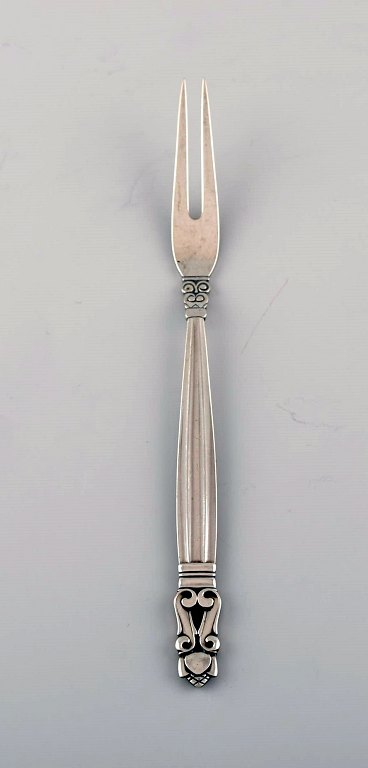 Large Georg Jensen Acorn cold meat fork in sterling silver.
