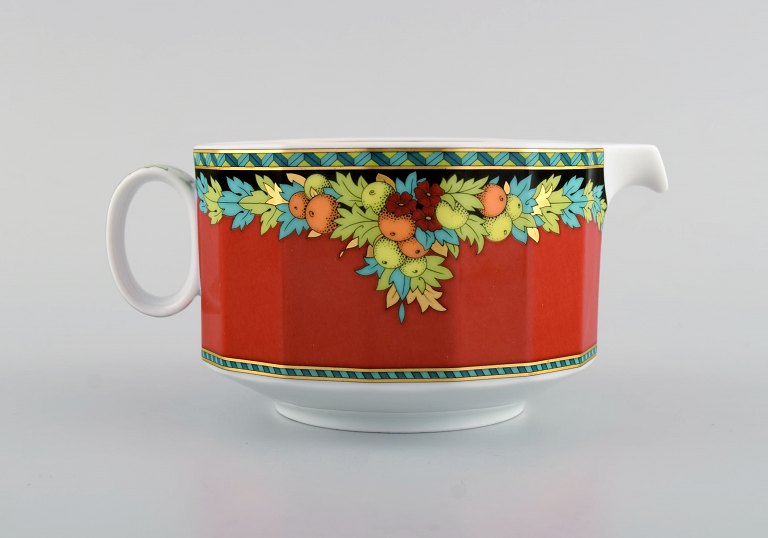 Gianni Versace for Rosenthal. Le Roi Soleil porcelain sauce jug with floral and 
gold decoration. Late 20th century.
