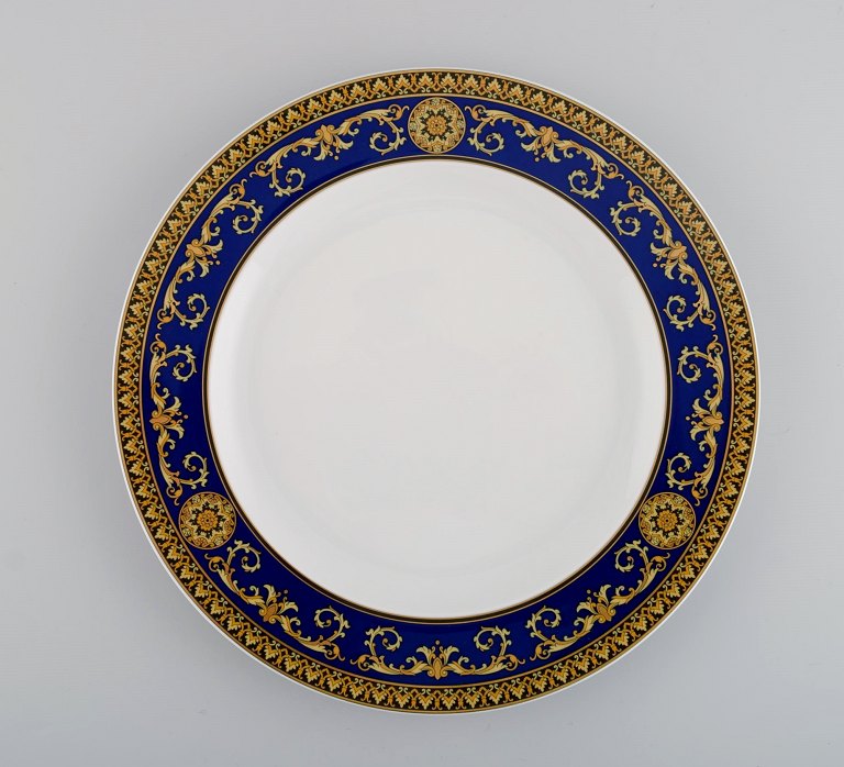 Gianni Versace for Rosenthal. Medusa Blue porcelain plate with gold decoration. 
Late 20th century.
