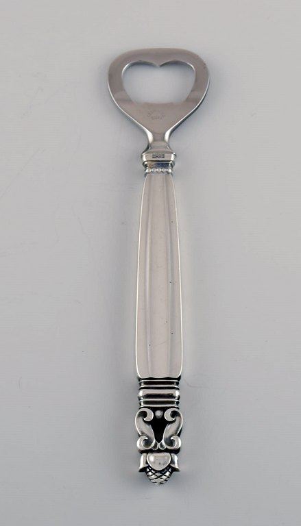 Georg Jensen Acorn bottle opener in sterling silver and stainless steel.
